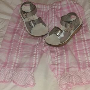 Saltwater sandles with bell bottom pants